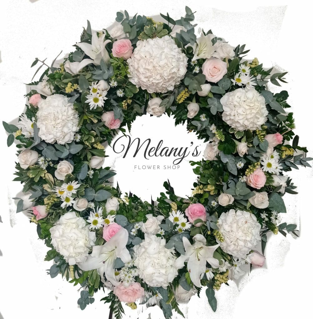 Corona funebre de pesame con hortensias